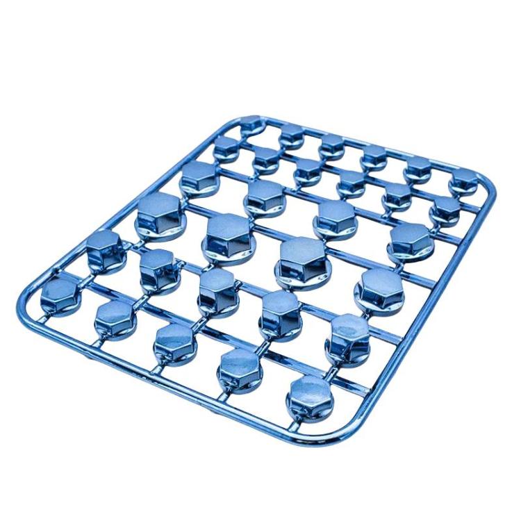 Blue decorative hex screw caps in a plastic organizer tray