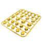 Golden decorative hex screw caps in a plastic organizer tray