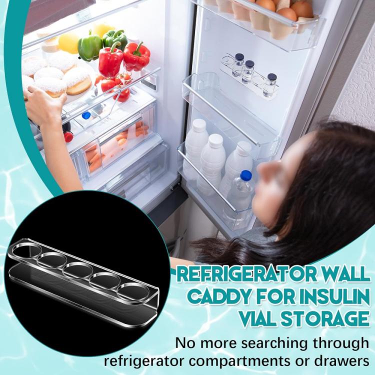 Refrigerator wall bottle caddy with five circular holes on counter beside insulin vials