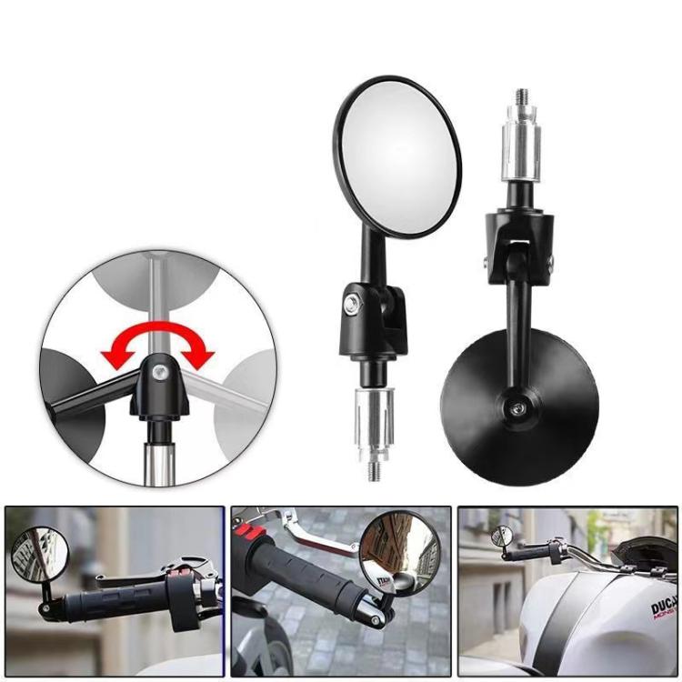 Folding round rearview mirror with black mount, clear lens, and inset adjustment arrows