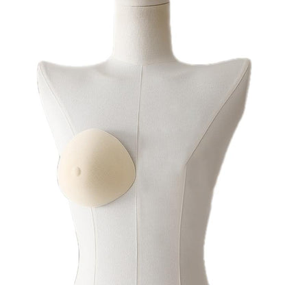 Non-adhesive post-mastectomy bra with one beige prosthetic breast pad on mannequin