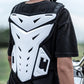 Motorcycle chest armor vest with white front plate on black shirt