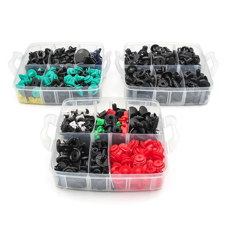 Clear case of mixed automotive retainer clips: black, teal, and red pieces