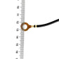 O-type ring terminal shown with ruler for size reference on black wire