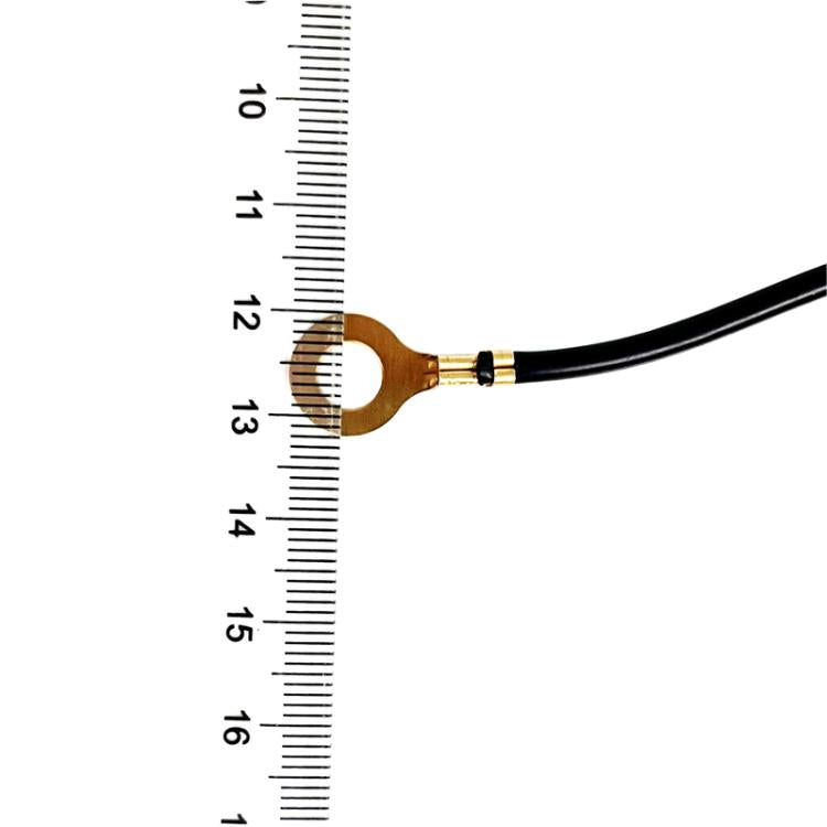 O-type ring terminal shown with ruler for size reference on black wire