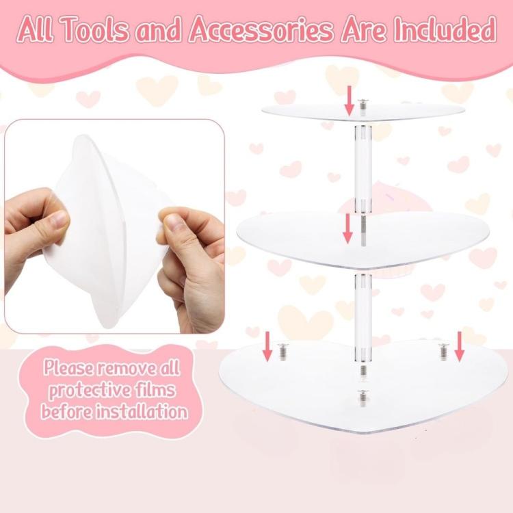 Three-tier heart-shaped acrylic cupcake stand with protective film being removed