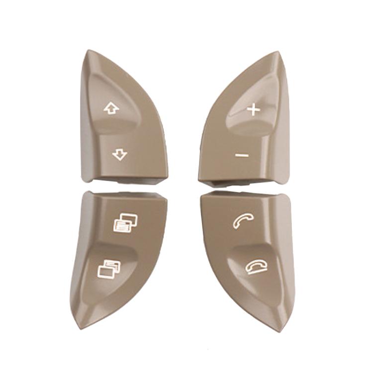 Stone beige steering wheel multi-function button covers with plus, minus, home and phone icons