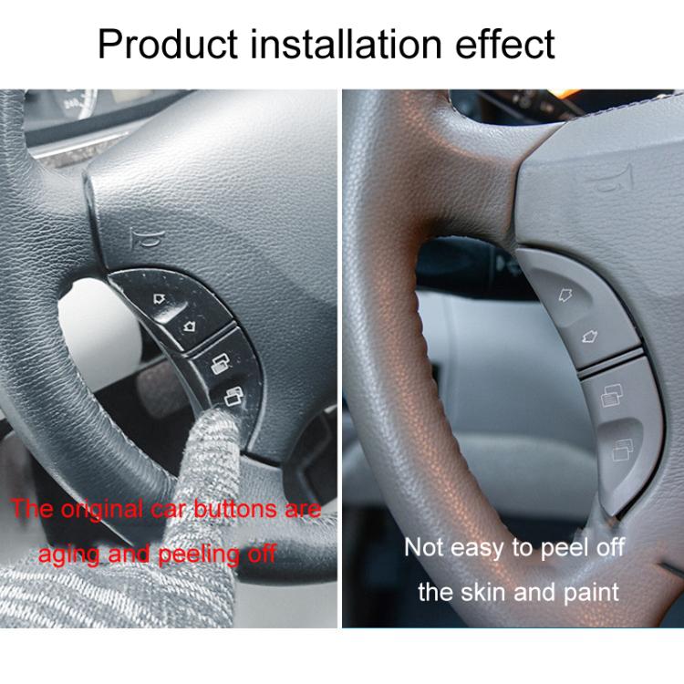Installed steering wheel multi-function button covers on textured trim with plus and phone icons