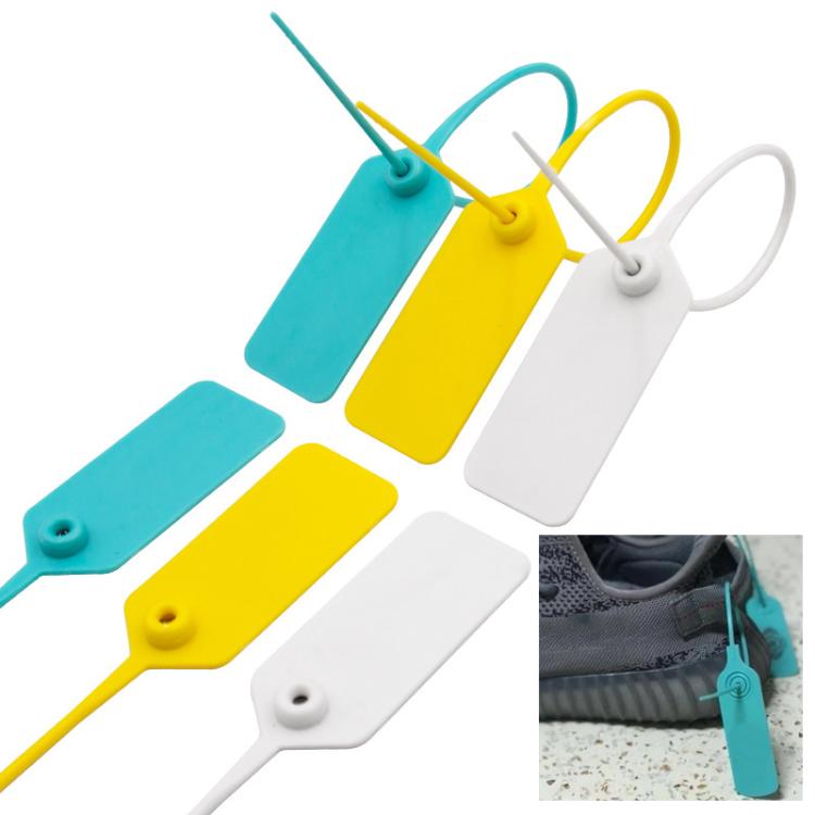 Colorful plastic anti-theft seal tags with looped tie cords, shown in blue yellow white