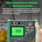 Handheld ground resistance tester held in hand with green LCD and test keypad
