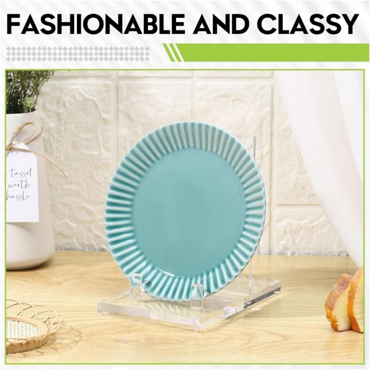 Clear acrylic display stand with base and upright panel, supporting a decorative plate