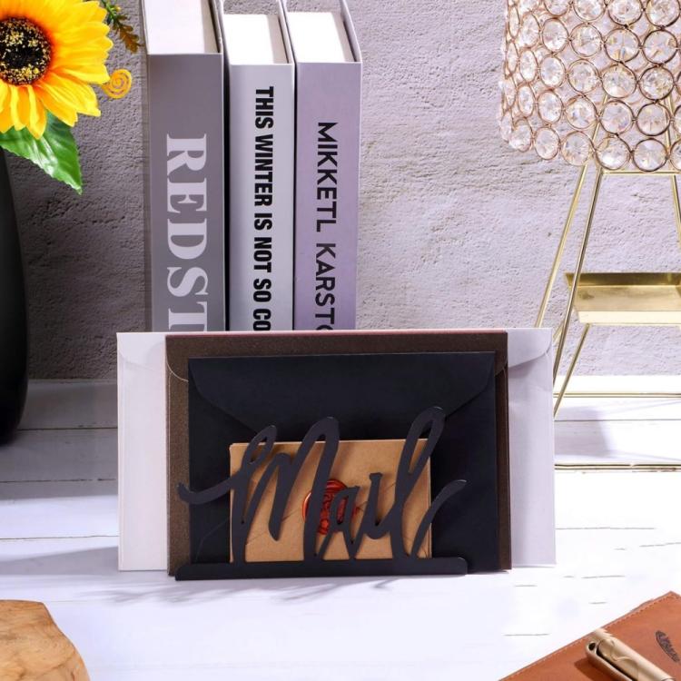 Black metal mail letter storage rack with 'Mail' cutout, displaying letters in box