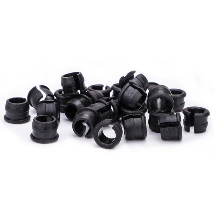 Pile of black Schrader-to-Presta valve adapter sleeves (10 pcs)