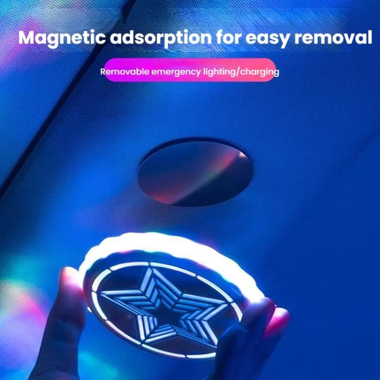 Magnetic LED car roof light held in hands, star emblem glowing brightly