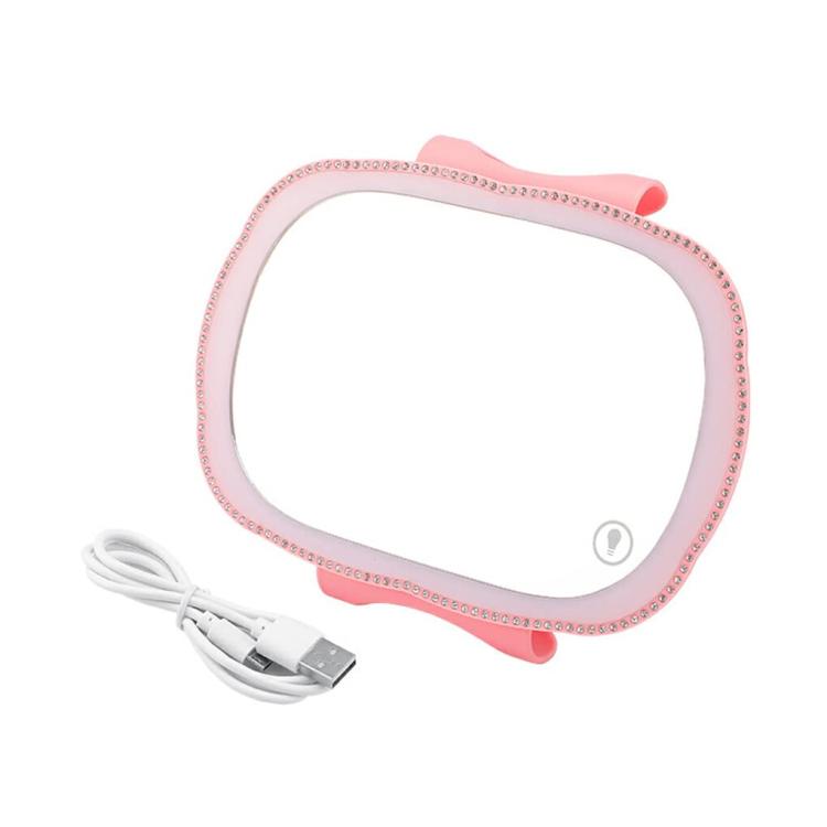 Pink oval LED vanity mirror for car sun visor, with USB charging cable