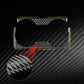 Black carbon-fiber gear shift cup holder trim with two circular openings, close-up