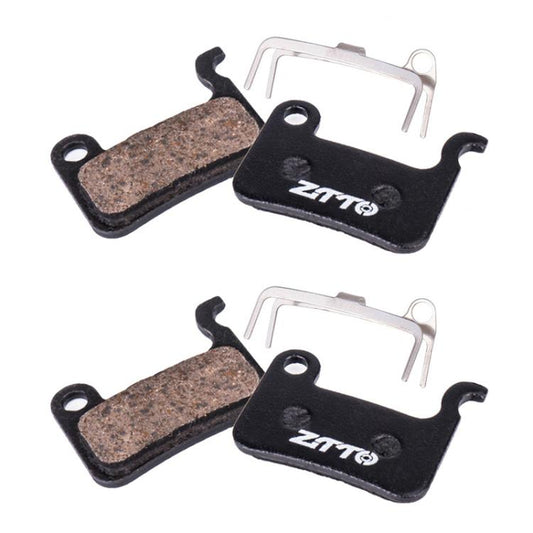 ZTTO bicycle disc brake pads pair with brown semi-metallic friction blocks and black backing
