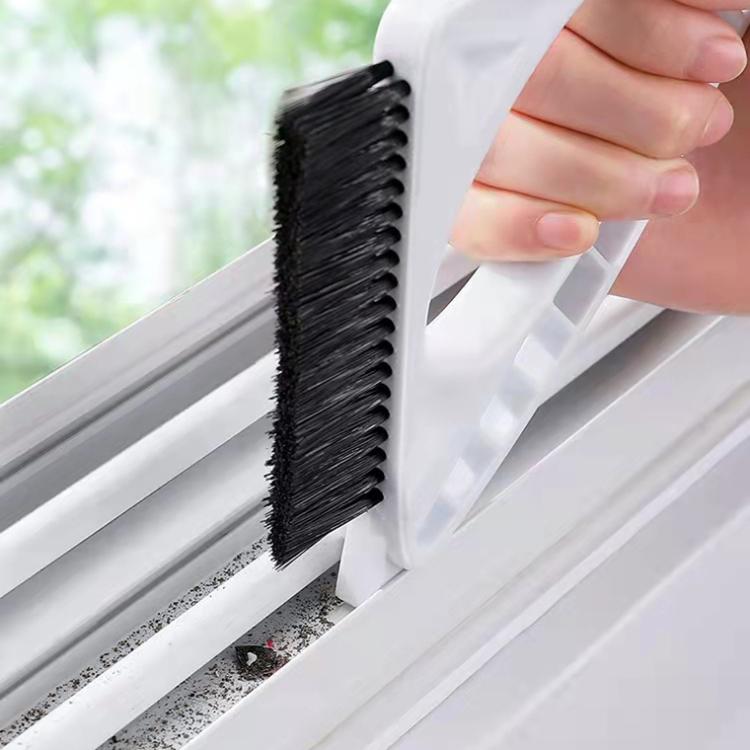Window track cleaning tool with black bristle brush for tight corner gaps