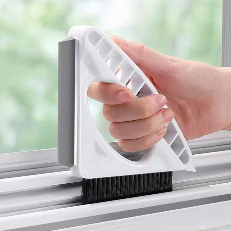 White triangular gap brush with black bristles for cleaning window frames