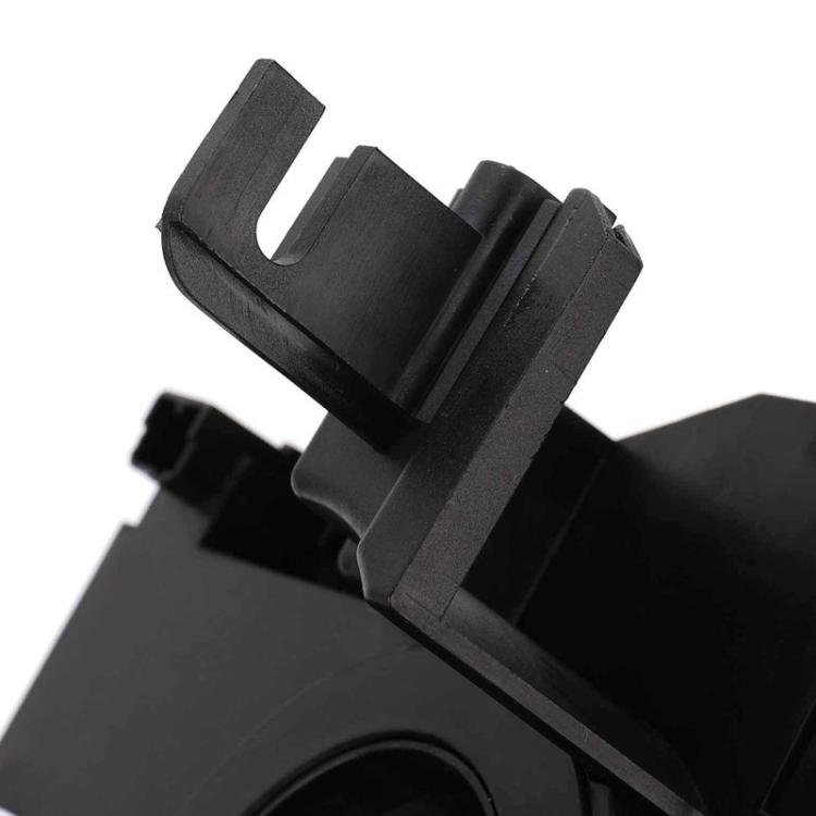 Black clock spring coil with molded latch tab and connector housing