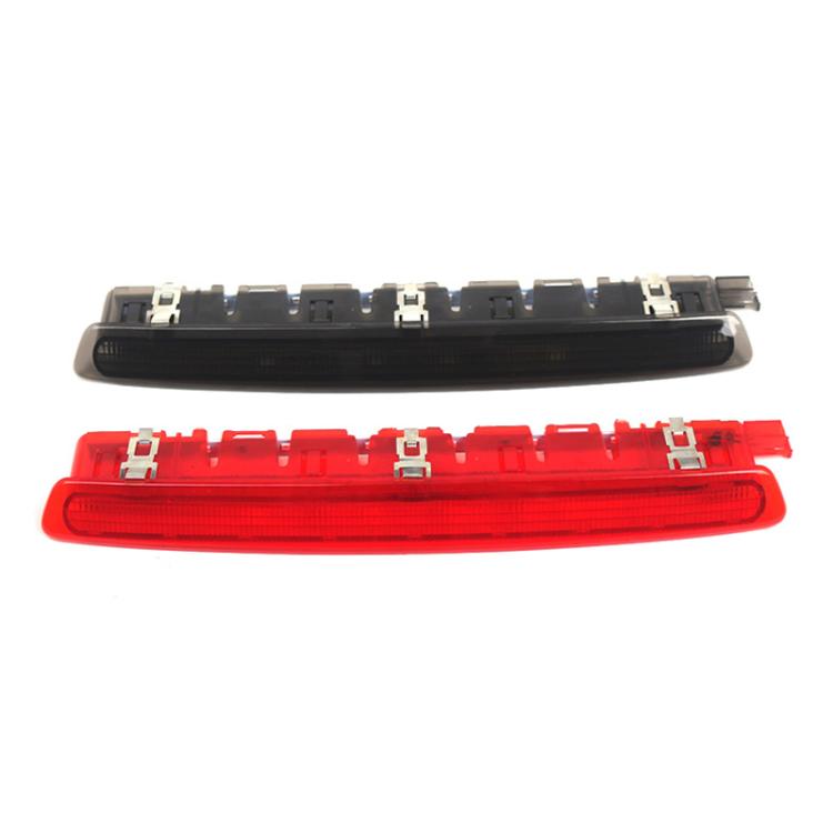 Red and black high mount third brake light lamps, side-by-side
