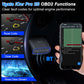 Black Bluetooth OBD2 diagnostic adapter held near dashboard with blue LED ring