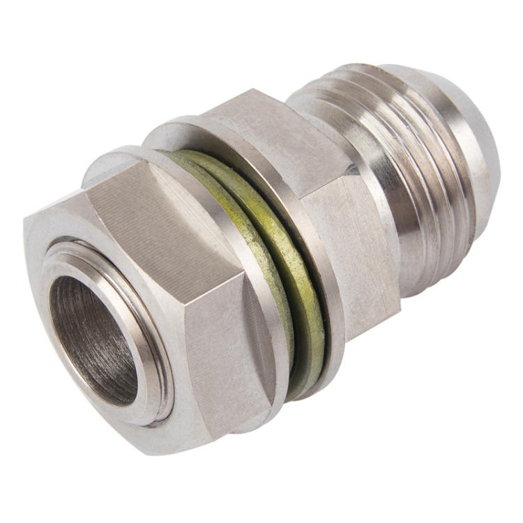 Metal oil filter connector plug with green gasket and threaded ends