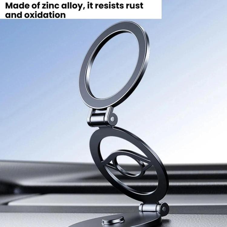 Metal-look magnetic phone holder with rotating ring arm on a car dashboard