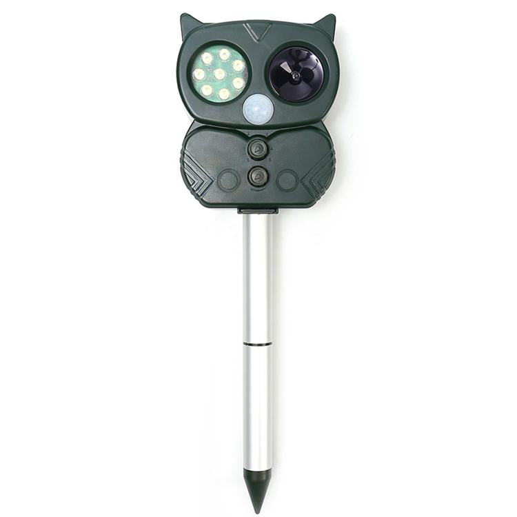 Green cat-shaped solar ultrasonic repeller with LED panel and black circular speaker