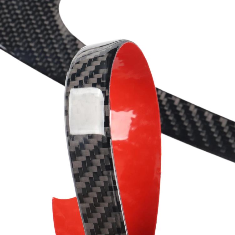 Triangular carbon-fiber door panel sticker with red outer edge, curved trim piece