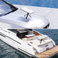 Tripod with gimbal adapter on a boat deck, white top mounting plate