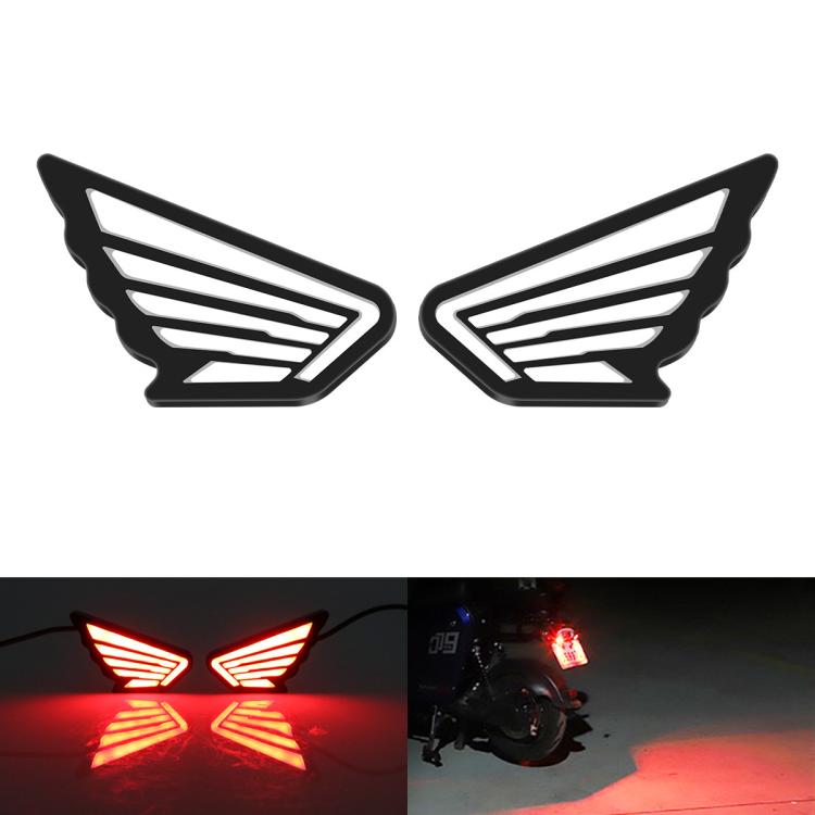 Pair of wing-shaped LED marker lights with red glowing stripes