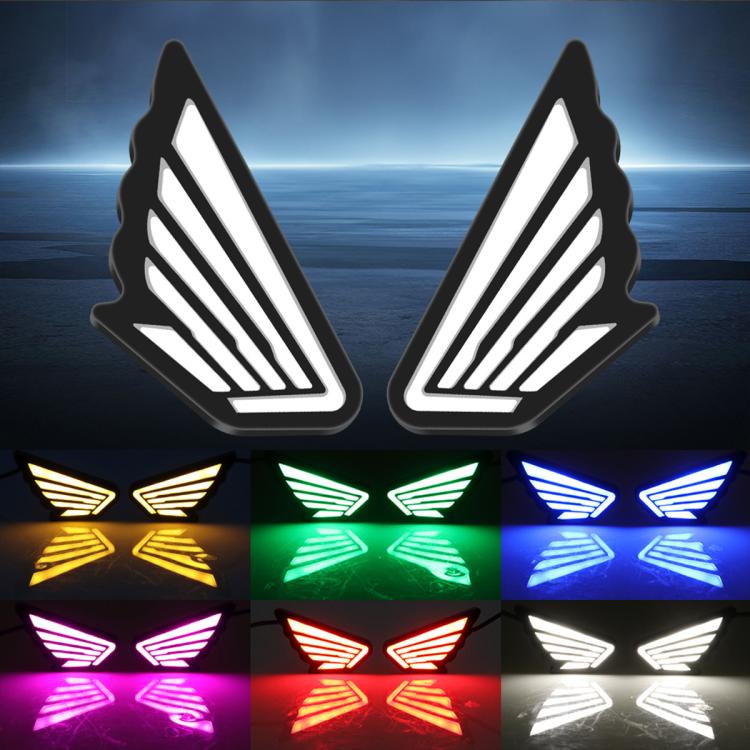 Wing-shaped LED light set with multiple glow colors, shown in blue, green, red