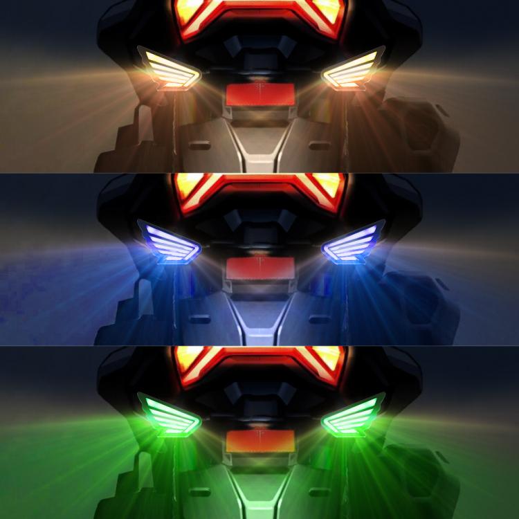 LED winged eagle eye headlight accents with red, blue, and green glow