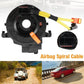 Automotive clock spring reel with yellow and orange wiring harness connectors