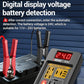 Digital voltage relay detector with red screen and connected alligator clips on a car battery