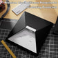 Black textured silicone protective cover with white insert on a cutting mat