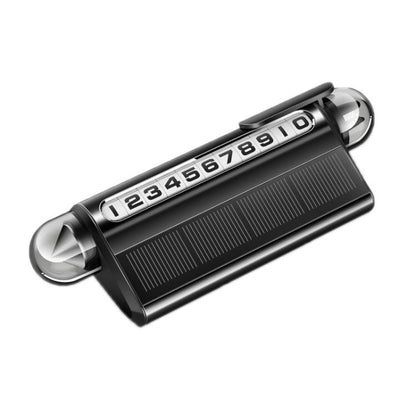 Black temporary parking sign with rotating number dial and solar LED light