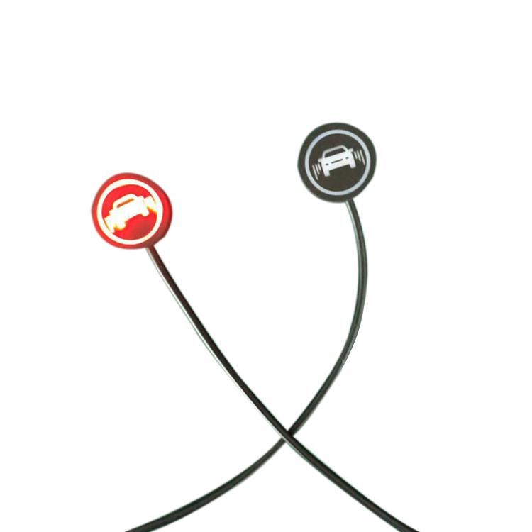 Blind spot auxiliary lens lights with red and white icons, connected by black cables