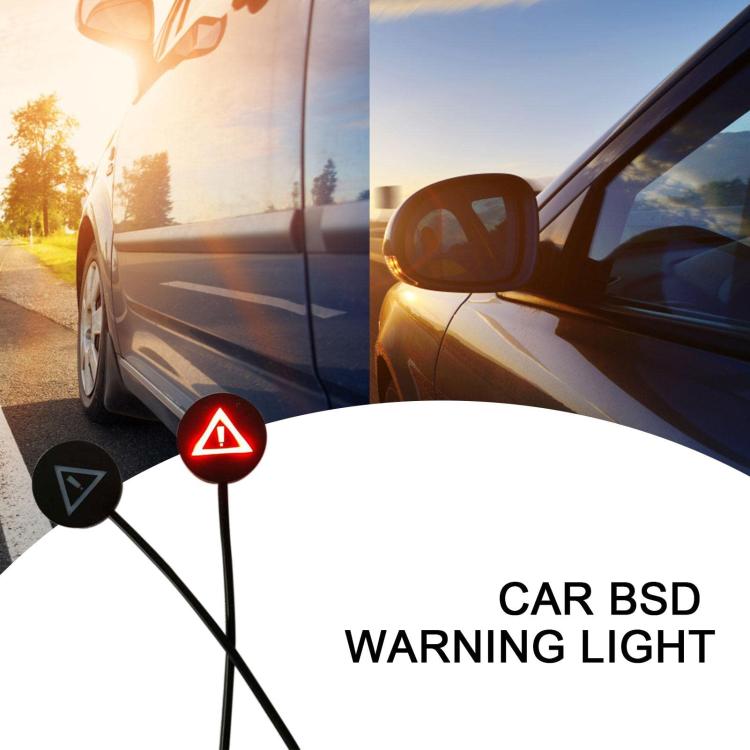 Blind spot warning auxiliary lens lights with dark round housings and red triangle icon