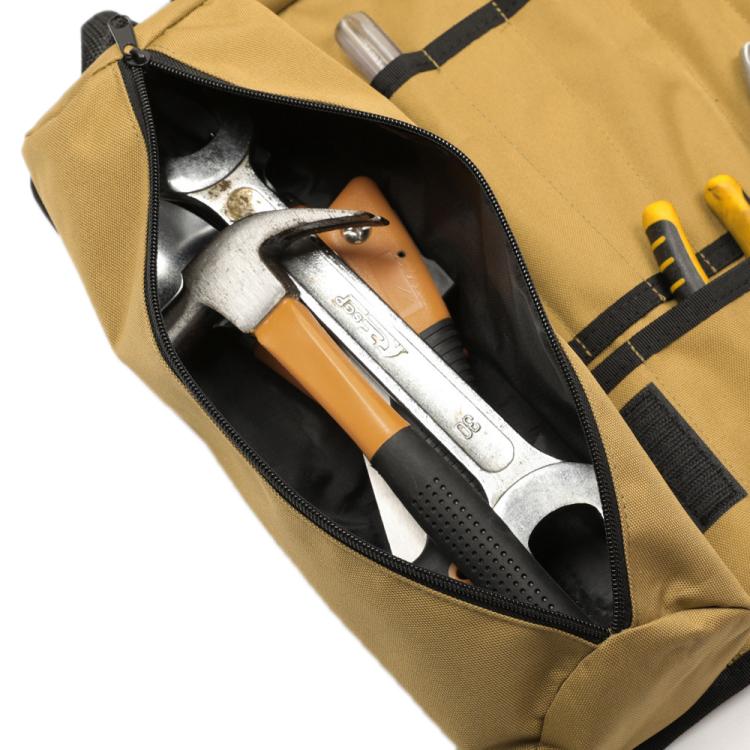 Tan waterproof tool pouch with zippered pocket holding hand tools