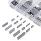 Feather pin keys scattered on white, gray metal rectangular pins
