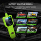Green handheld automotive circuit tester with LCD screen, with accessory cable attached