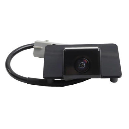 Rear view camera with black housing and attached cable