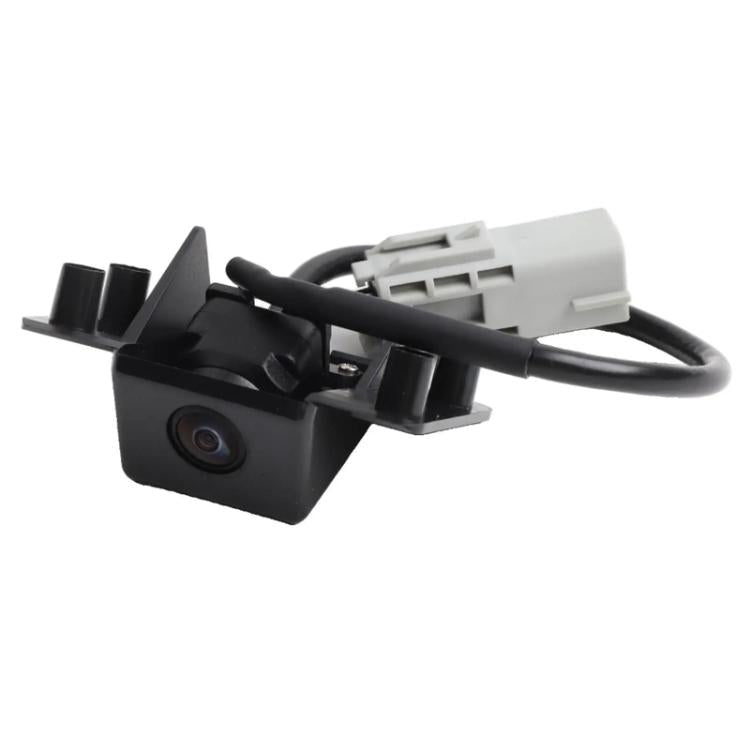 Rear view camera module with mounting bracket and wire harness
