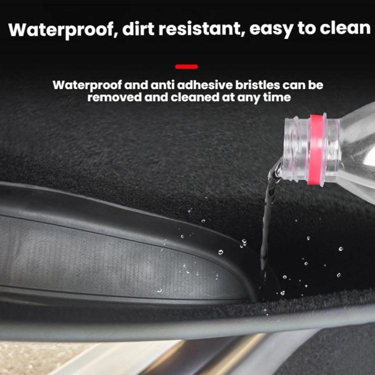 Door slot storage box insert with water spray on dark fabric surface