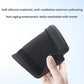 Fold-down armrest storage tray, dark matte black textured surface and side grip