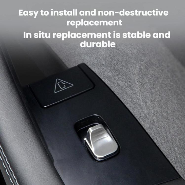Window lift button sticker insert on black switch panel with silver button cover