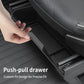 Pull-out front seat storage drawer with black compartment tray and divider