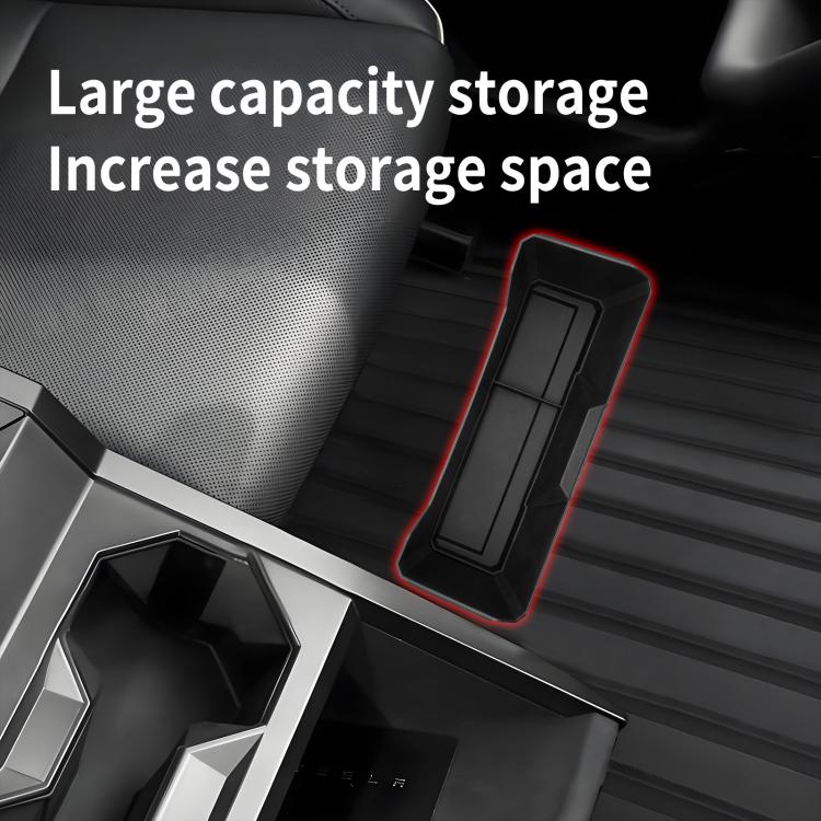 Front seat storage bin with open compartments and tall side walls for larger items